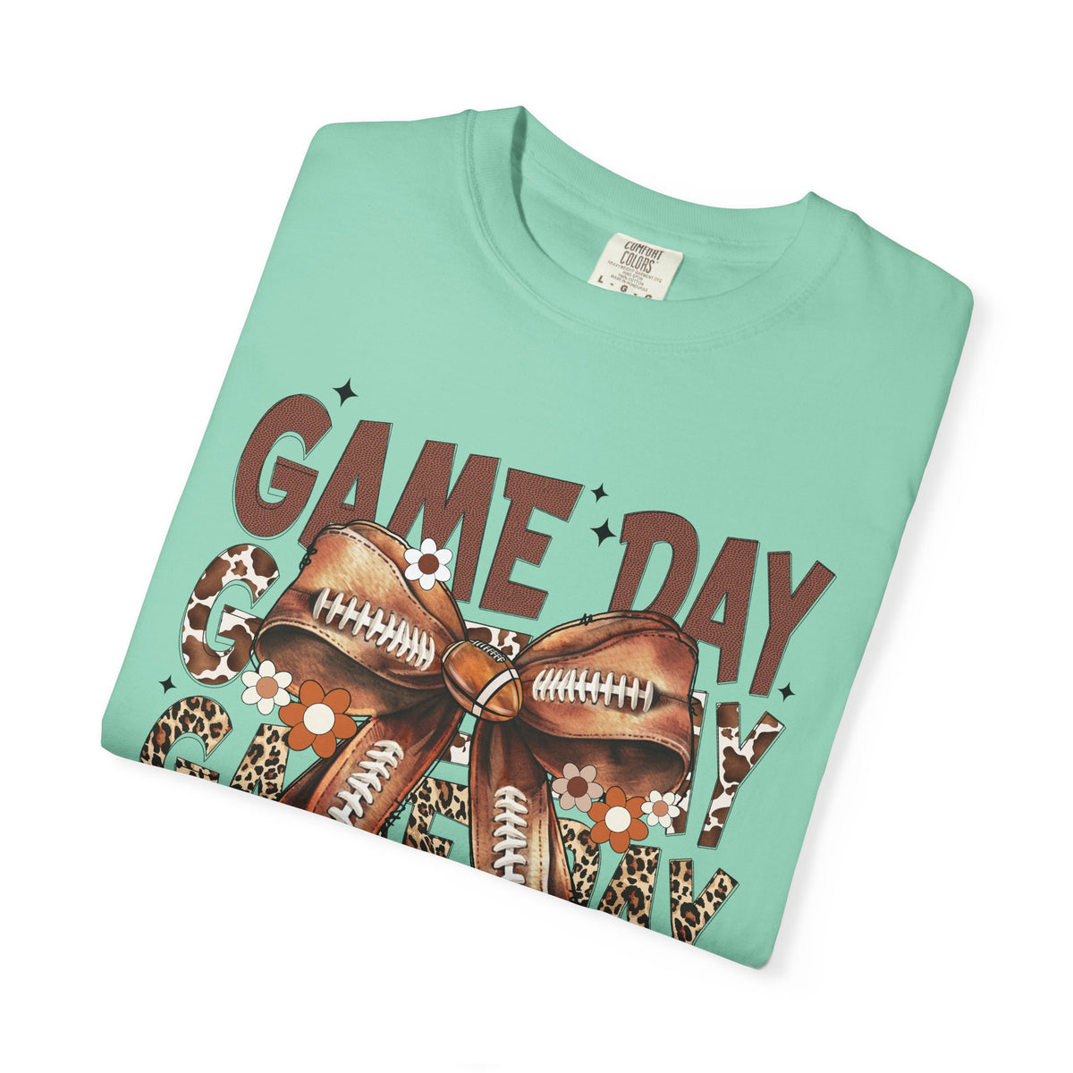 Game Day - Football Bow - Comfort Colors | Trendy Women's T-Shirt. Direct to Garment. Printed & Shipped in the USA. Unisex Sizes.