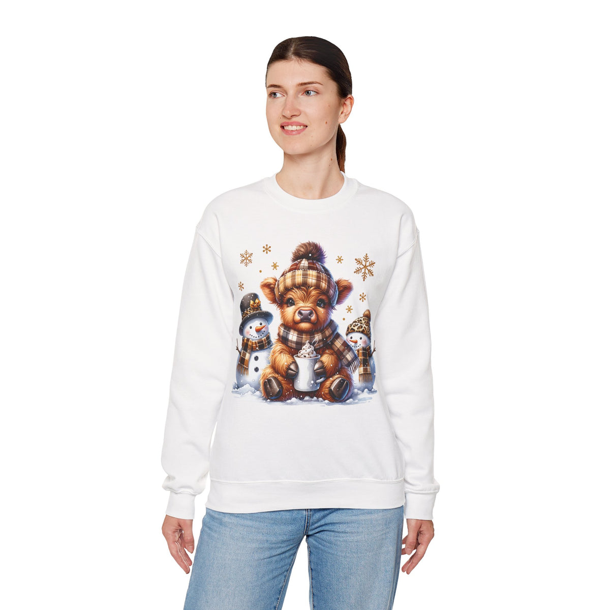 Cute Highland Cow with Snowmen, Winter – Gildan Heavy Blend | Trendy Women’s Soft Sweatshirt. Direct to Garment. Printed & Shipped in the USA. Unisex Sizes.