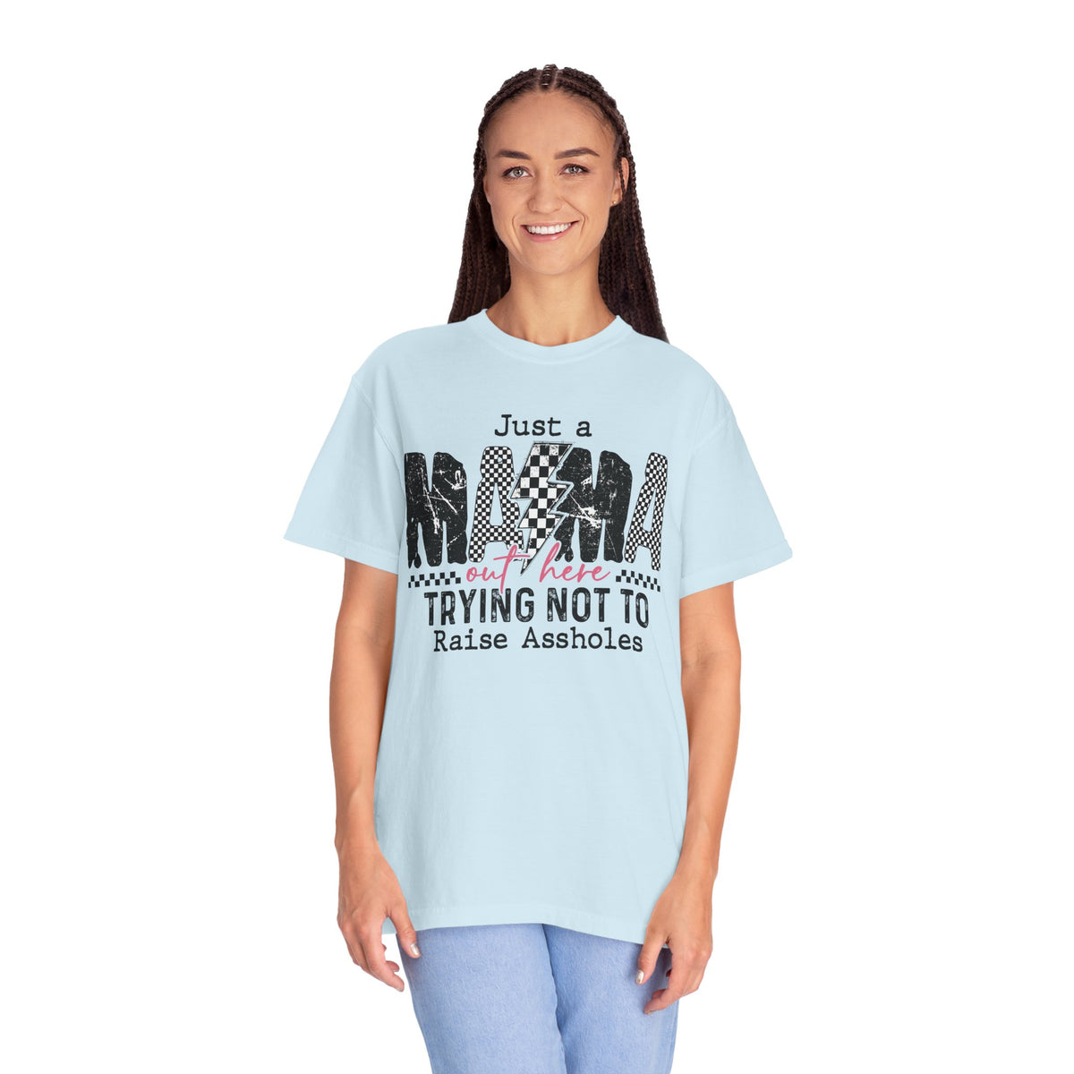 Just a Mama Out Here Trying Not To Raise Assholes - Comfort Colors | Trendy Women's T-Shirt. Direct to Garment. Printed & Shipped in the USA. Unisex Sizes.