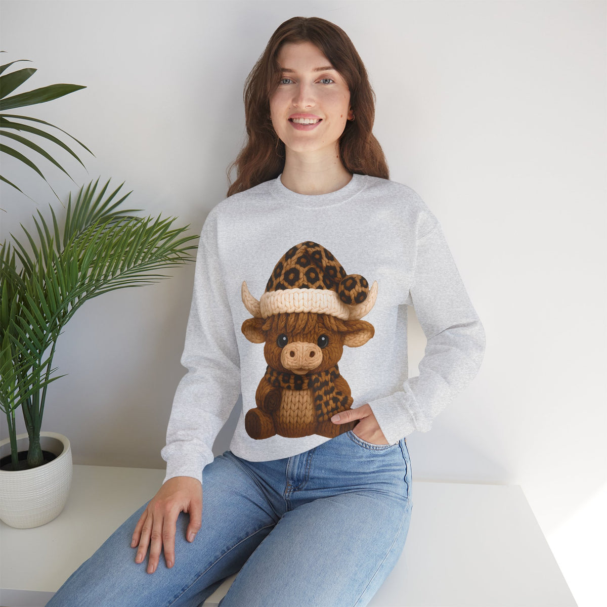 Cute Highland Cow with Leopard Santa Hat Christmas – Gildan Heavy Blend | Trendy Women’s Soft Sweatshirt. Direct to Garment. Printed & Shipped in the USA. Unisex Sizes.