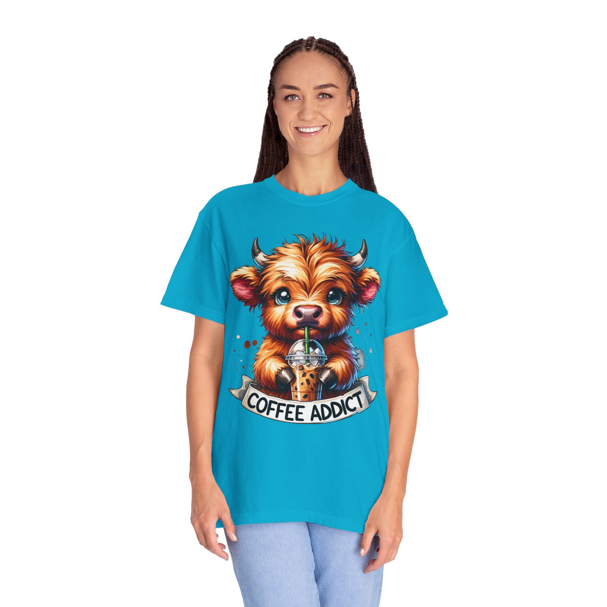 Coffee Addict Highland Cow Drinking Iced Coffee - Comfort Colors | Trendy Women's T-Shirt. Direct to Garment. Printed & Shipped in the USA. Unisex Sizes.