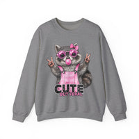 Cute But Feral, Raccoon in Pink Bibs – Gildan Heavy Blend | Trendy Women’s Soft Sweatshirt. Direct to Garment. Printed & Shipped in the USA. Unisex Sizes.