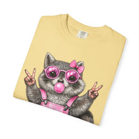Cute But Feral, Raccoon in Pink Bibs - Comfort Colors | Trendy Women's T-Shirt. Direct to Garment. Printed & Shipped in the USA. Unisex Sizes.