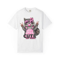 Cute But Feral, Raccoon in Pink Bibs - Comfort Colors | Trendy Women's T-Shirt. Direct to Garment. Printed & Shipped in the USA. Unisex Sizes.