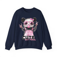 Cute But Feral, Possum in Pink Bibs – Gildan Heavy Blend | Trendy Women’s Soft Sweatshirt. Direct to Garment. Printed & Shipped in the USA. Unisex Sizes.