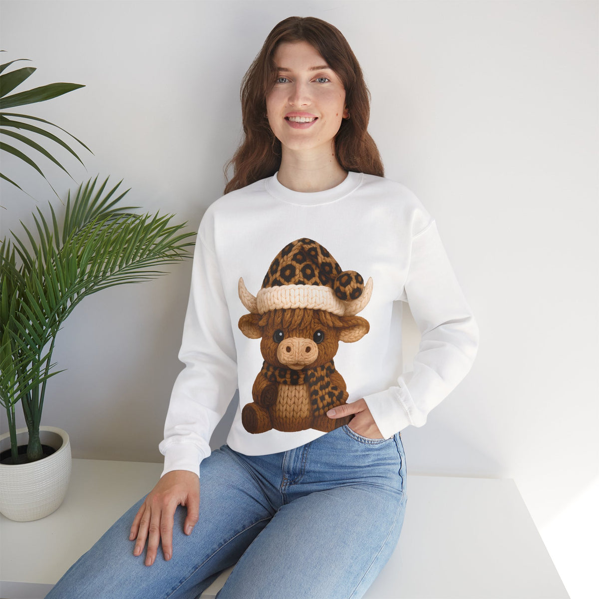 Cute Highland Cow with Leopard Santa Hat Christmas – Gildan Heavy Blend | Trendy Women’s Soft Sweatshirt. Direct to Garment. Printed & Shipped in the USA. Unisex Sizes.