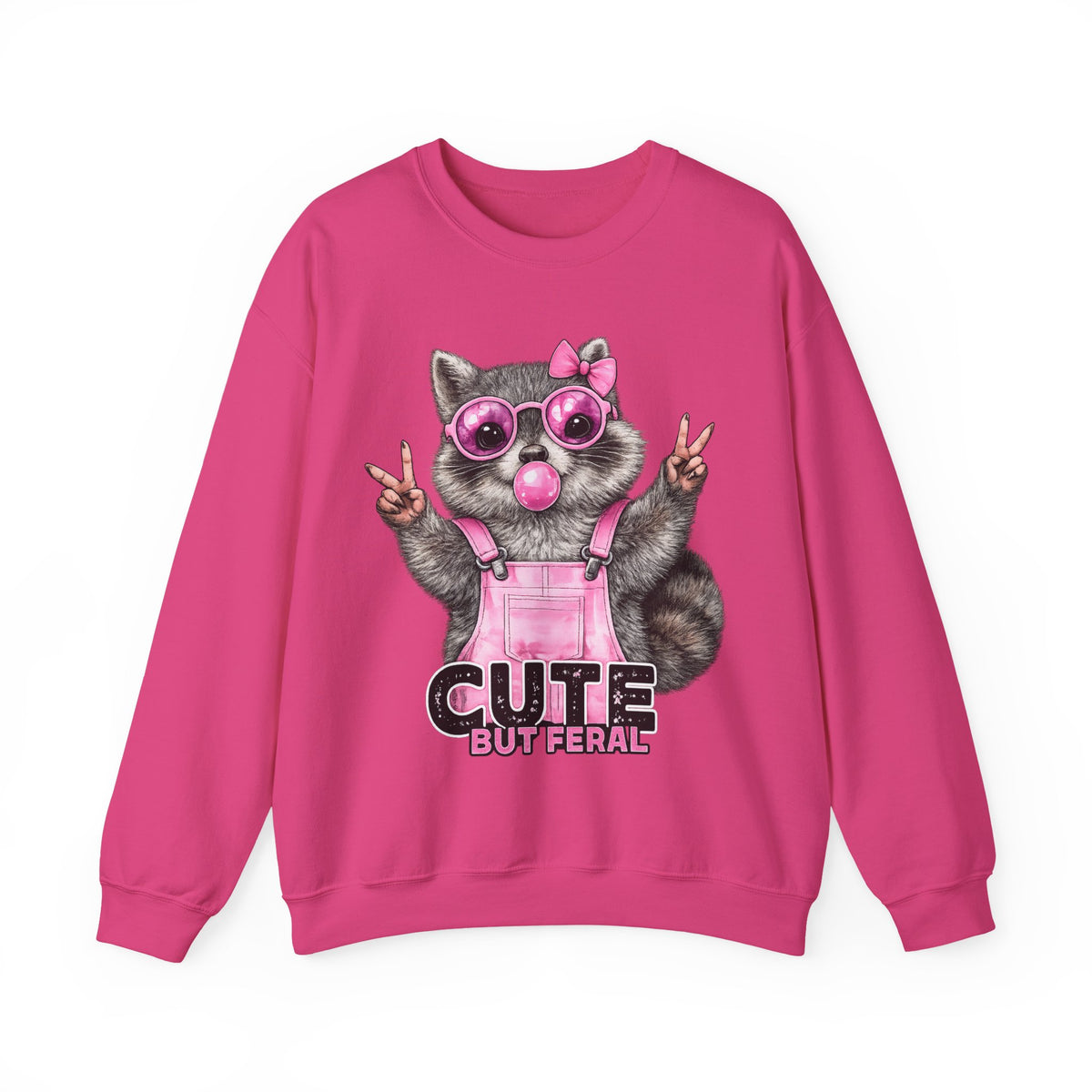 Cute But Feral, Raccoon in Pink Bibs – Gildan Heavy Blend | Trendy Women’s Soft Sweatshirt. Direct to Garment. Printed & Shipped in the USA. Unisex Sizes.