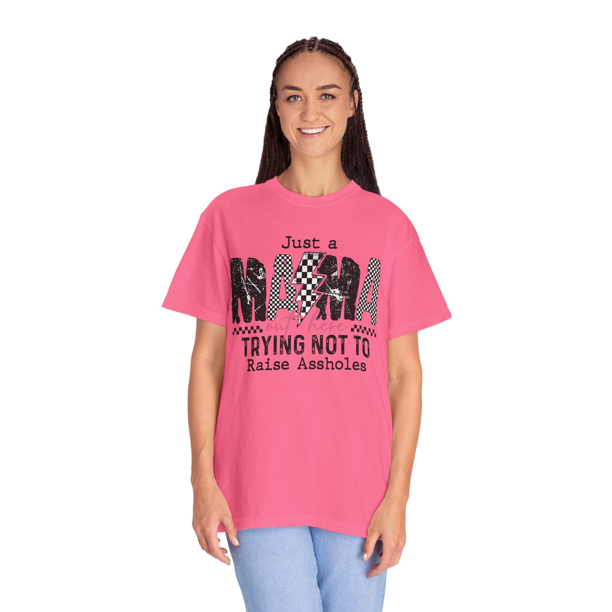 Just a Mama Out Here Trying Not To Raise Assholes - Comfort Colors | Trendy Women's T-Shirt. Direct to Garment. Printed & Shipped in the USA. Unisex Sizes.
