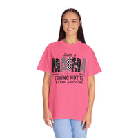 Just a Mama Out Here Trying Not To Raise Assholes - Comfort Colors | Trendy Women's T-Shirt. Direct to Garment. Printed & Shipped in the USA. Unisex Sizes.