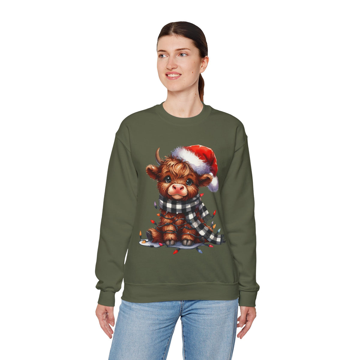 Cute Highland Cow Santa Hat Scarf Christmas Lights – Gildan Heavy Blend | Trendy Women’s Soft Sweatshirt. Direct to Garment. Printed & Shipped in the USA. Unisex Sizes.
