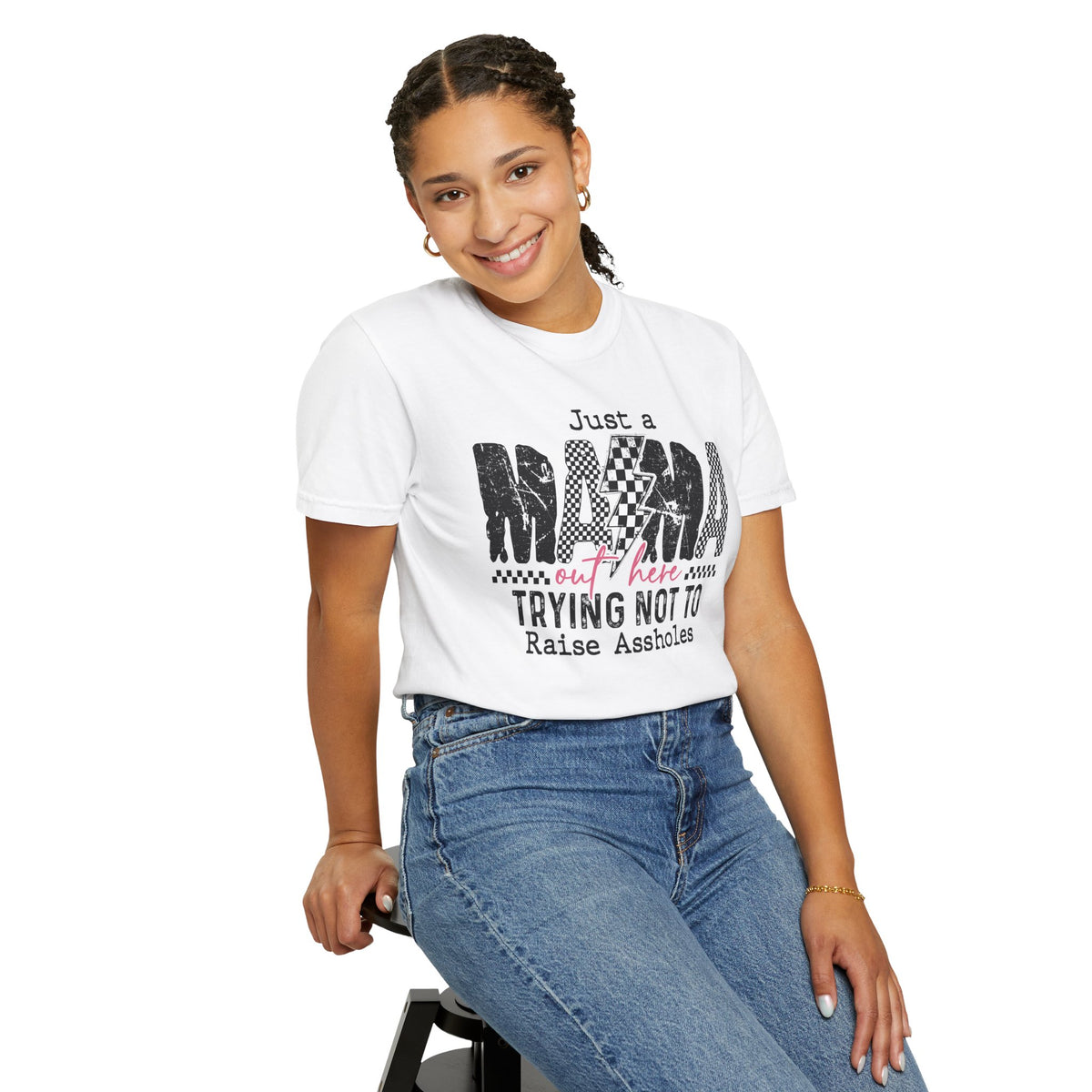 Just a Mama Out Here Trying Not To Raise Assholes - Comfort Colors | Trendy Women's T-Shirt. Direct to Garment. Printed & Shipped in the USA. Unisex Sizes.