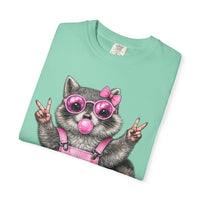 Cute But Feral, Raccoon in Pink Bibs - Comfort Colors | Trendy Women's T-Shirt. Direct to Garment. Printed & Shipped in the USA. Unisex Sizes.