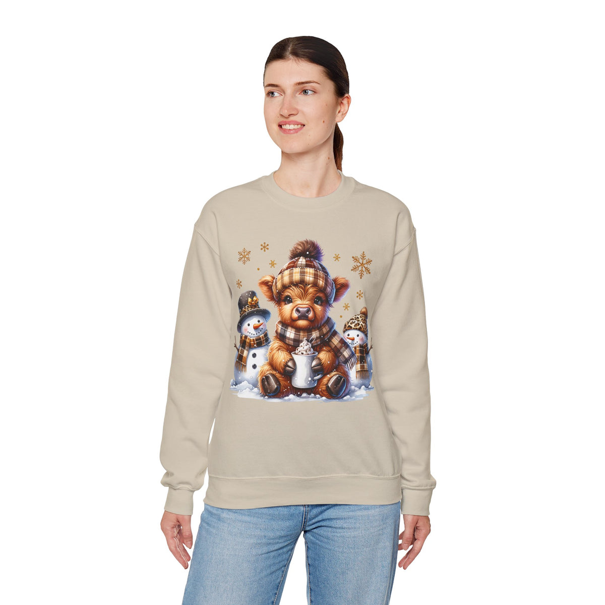 Cute Highland Cow with Snowmen, Winter – Gildan Heavy Blend | Trendy Women’s Soft Sweatshirt. Direct to Garment. Printed & Shipped in the USA. Unisex Sizes.