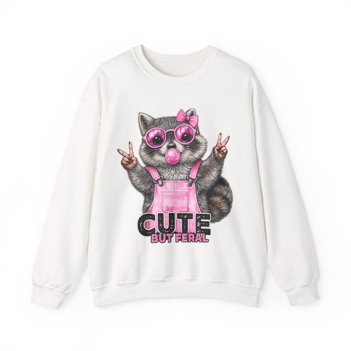 Cute But Feral, Raccoon in Pink Bibs – Gildan Heavy Blend | Trendy Women’s Soft Sweatshirt. Direct to Garment. Printed & Shipped in the USA. Unisex Sizes.