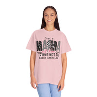 Just a Mama Out Here Trying Not To Raise Assholes - Comfort Colors | Trendy Women's T-Shirt. Direct to Garment. Printed & Shipped in the USA. Unisex Sizes.