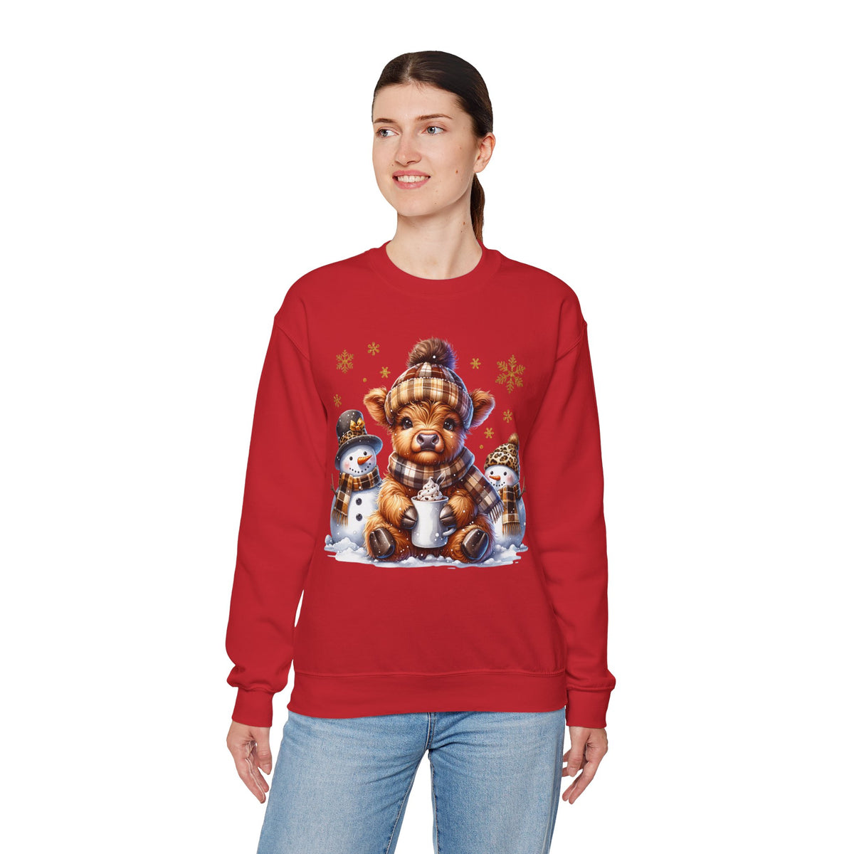 Cute Highland Cow with Snowmen, Winter – Gildan Heavy Blend | Trendy Women’s Soft Sweatshirt. Direct to Garment. Printed & Shipped in the USA. Unisex Sizes.