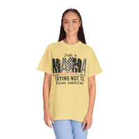 Just a Mama Out Here Trying Not To Raise Assholes - Comfort Colors | Trendy Women's T-Shirt. Direct to Garment. Printed & Shipped in the USA. Unisex Sizes.