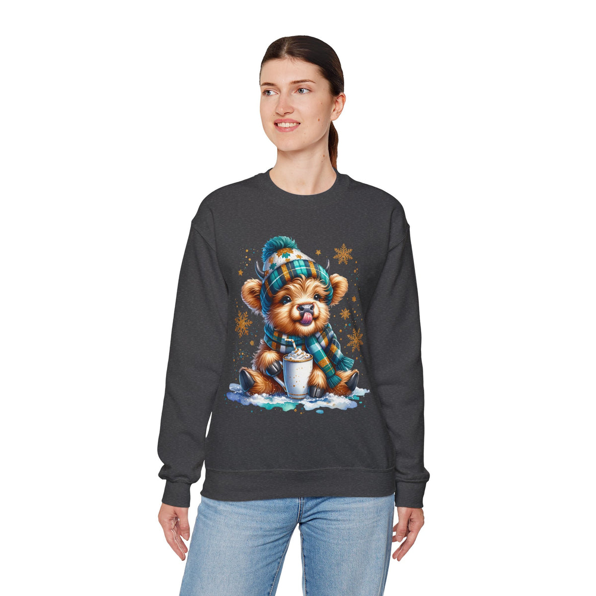 Winter Baby Highland Cow with Cocoa – Gildan Heavy Blend | Trendy Women’s Soft Sweatshirt. Direct to Garment. Printed & Shipped in the USA. Unisex Sizes.