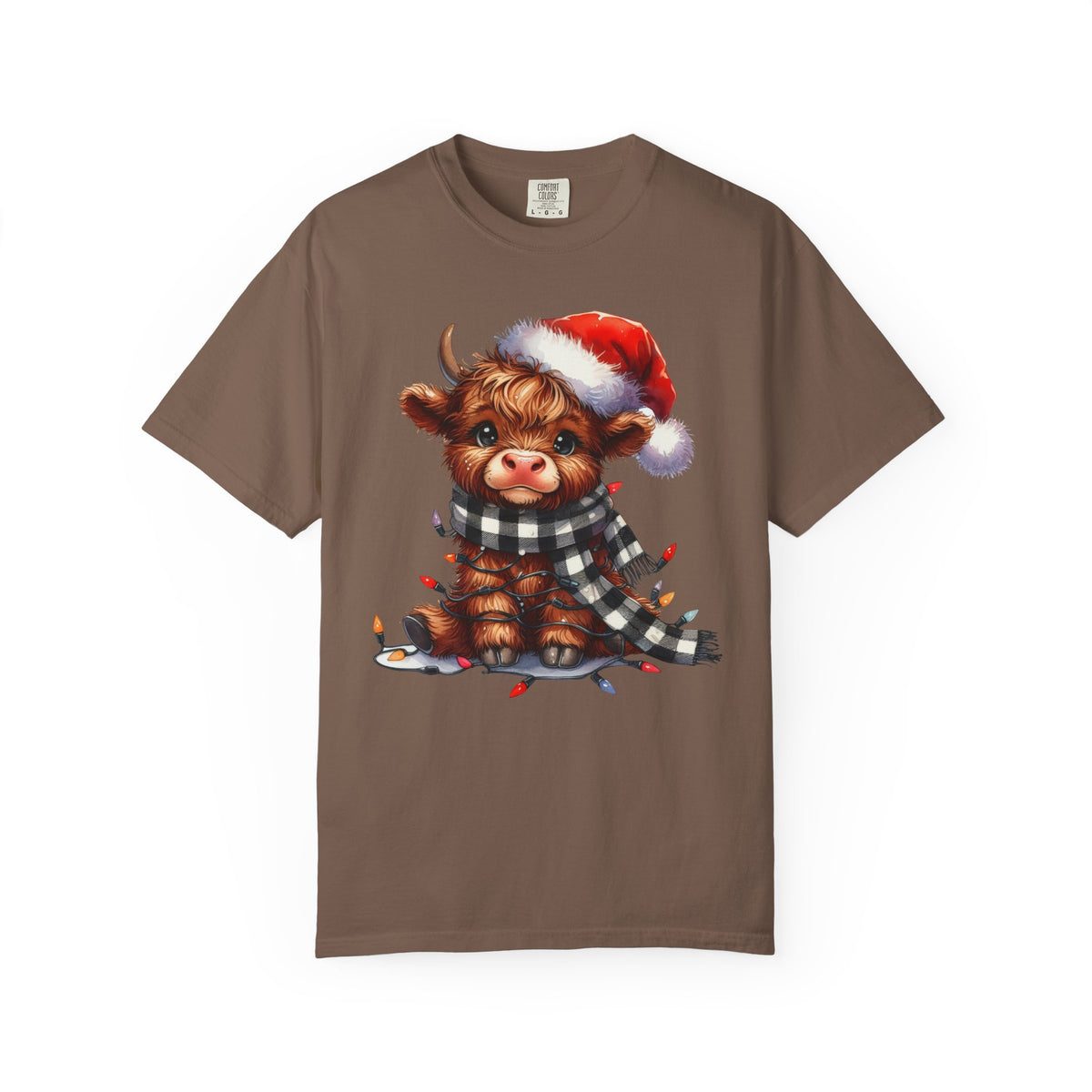 Cute Highland Cow Santa Hat Scarf Christmas Lights - Comfort Colors | Trendy Unisex T-Shirt. Direct to Garment. Printed & Shipped in the USA. Unisex Sizes.