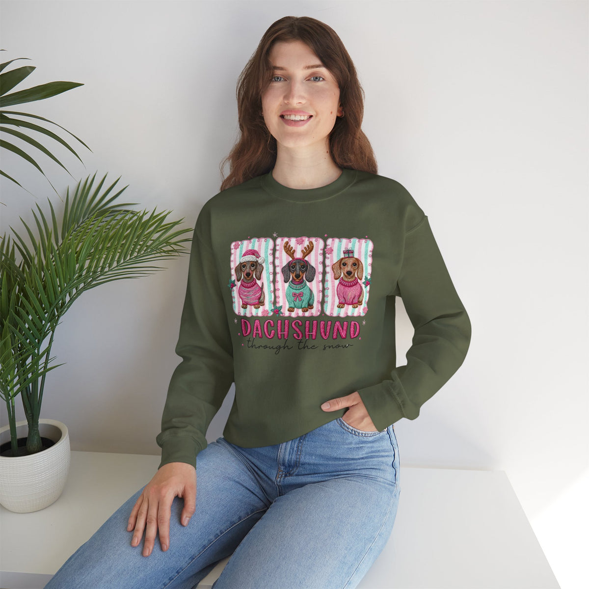 Dachshund Through the Snow – Gildan Heavy Blend | Trendy Women’s Soft Sweatshirt. Direct to Garment. Printed & Shipped in the USA. Unisex Sizes.