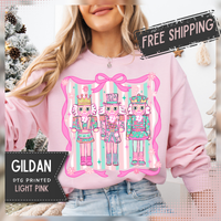Coquette Pastel Christmas Nutcracker Trio Pink and Green – Gildan Heavy Blend | Trendy Women’s Soft Sweatshirt. Direct to Garment. Printed & Shipped in the USA. Unisex Sizes.