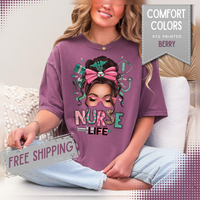 Nurse Life Messy Bun, Cute Stethoscope & Syringe - Comfort Colors | Trendy Women's T-Shirt. Direct to Garment. Printed & Shipped in the USA. Unisex Sizes.