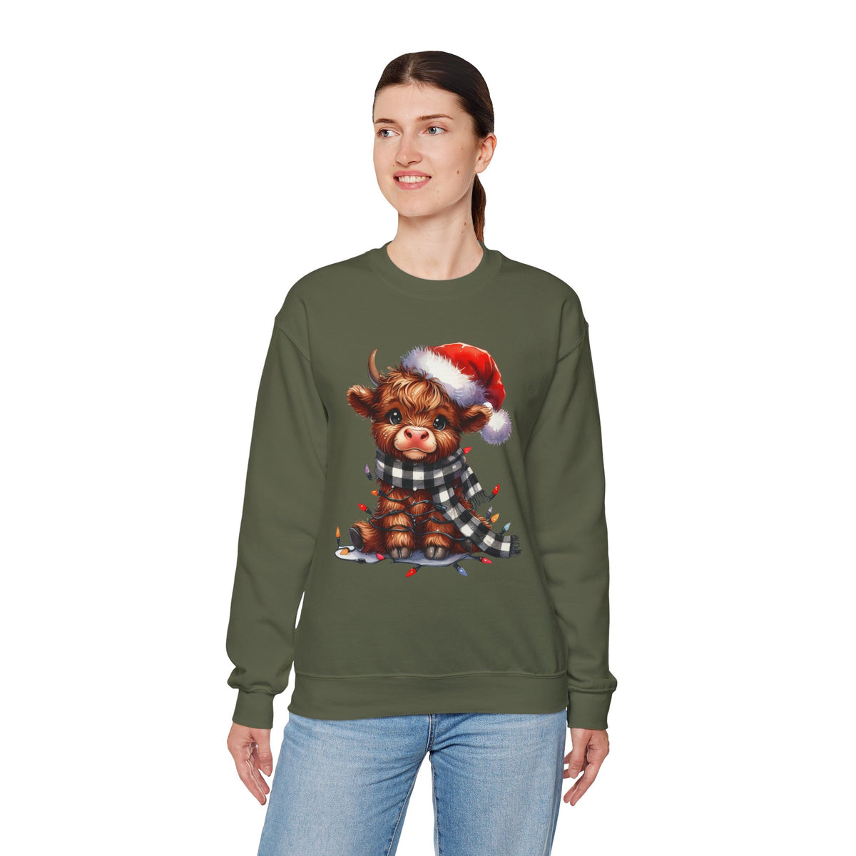 Cute Highland Cow Santa Hat Scarf Christmas Lights – Gildan Heavy Blend | Trendy Women’s Soft Sweatshirt. Direct to Garment. Printed & Shipped in the USA. Unisex Sizes.