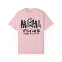 Just a Mama Out Here Trying Not To Raise Assholes - Comfort Colors | Trendy Women's T-Shirt. Direct to Garment. Printed & Shipped in the USA. Unisex Sizes.