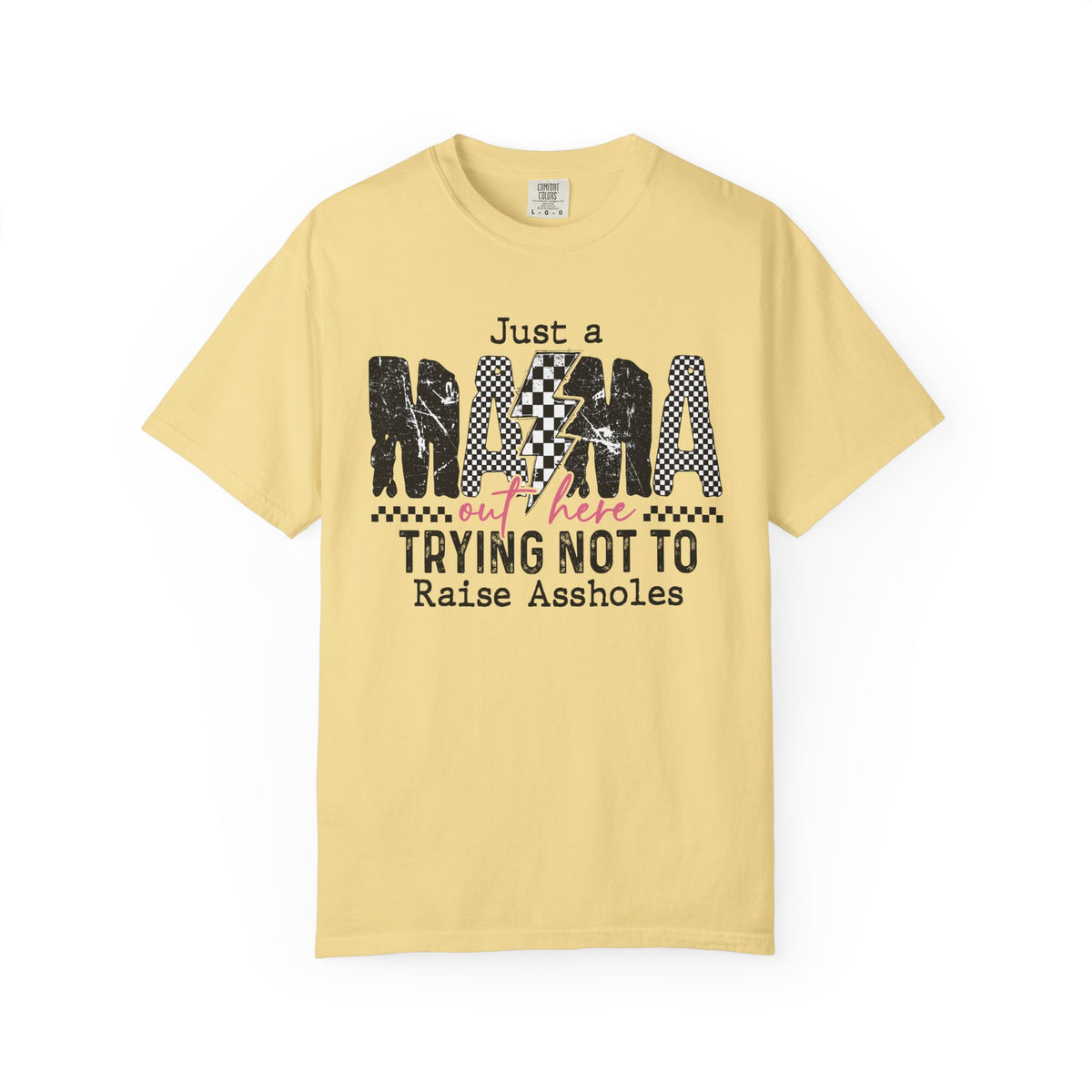 Just a Mama Out Here Trying Not To Raise Assholes - Comfort Colors | Trendy Women's T-Shirt. Direct to Garment. Printed & Shipped in the USA. Unisex Sizes.