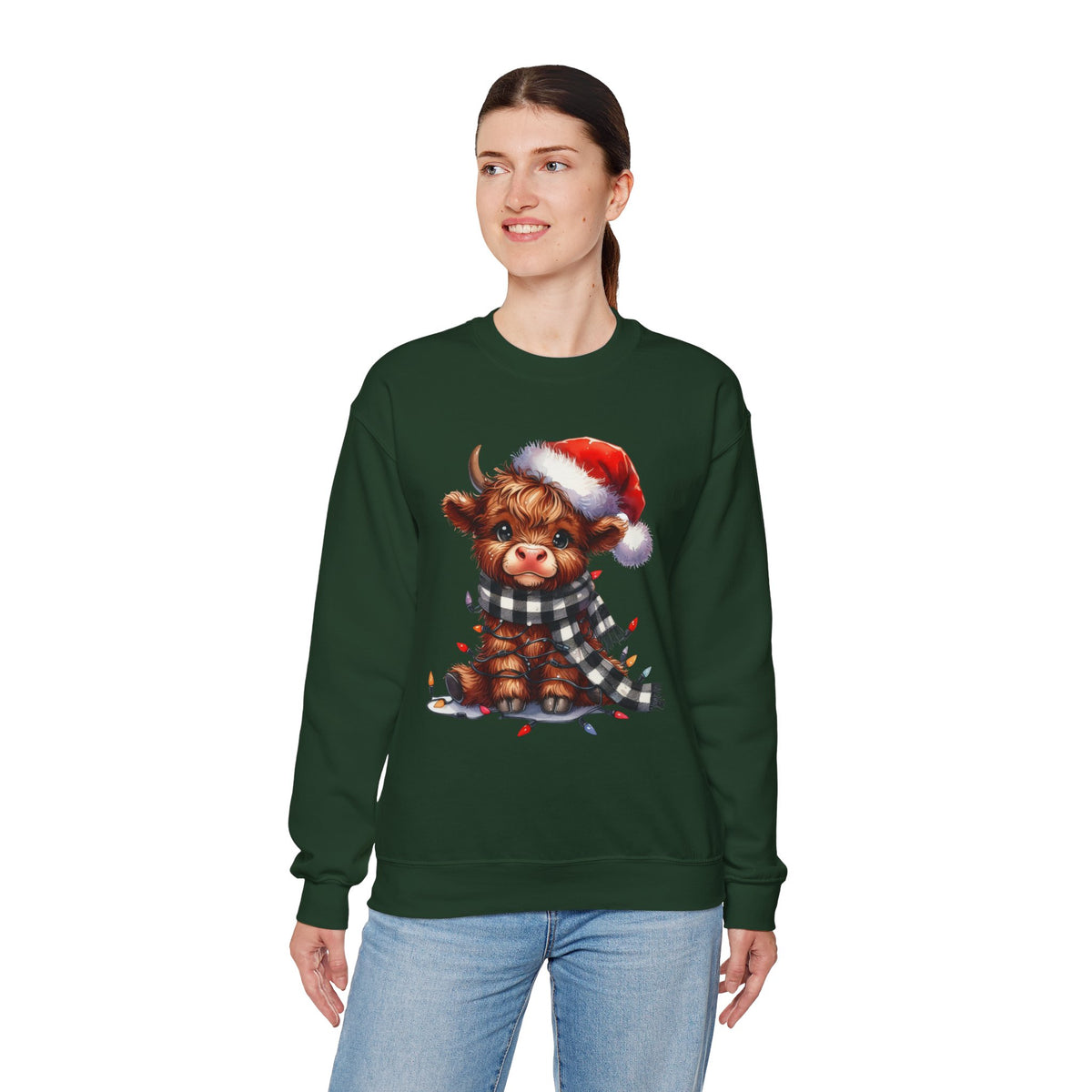 Cute Highland Cow Santa Hat Scarf Christmas Lights – Gildan Heavy Blend | Trendy Women’s Soft Sweatshirt. Direct to Garment. Printed & Shipped in the USA. Unisex Sizes.