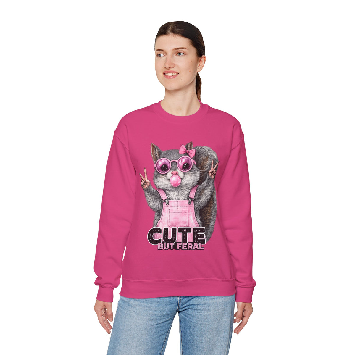 Cute But Feral, Squirrel in Pink Bibs – Gildan Heavy Blend | Trendy Women’s Soft Sweatshirt. Direct to Garment. Printed & Shipped in the USA. Unisex Sizes.