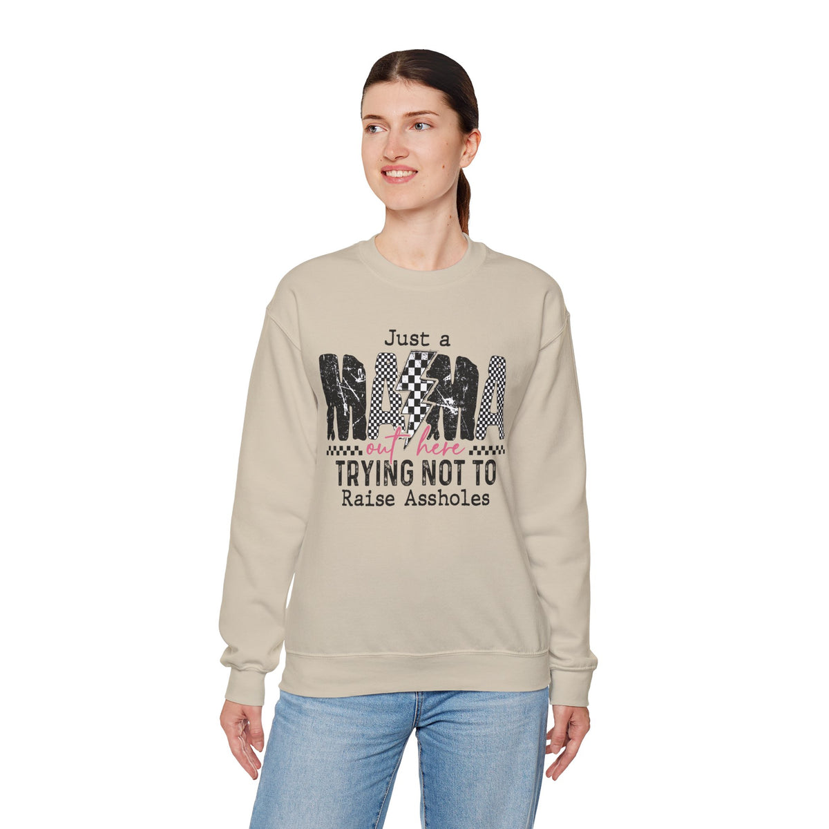 Just a Mama Out Here Trying Not To Raise Assholes – Gildan Heavy Blend | Trendy Women’s Soft Sweatshirt. Direct to Garment. Printed & Shipped in the USA. Unisex Sizes.