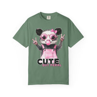 Cute But Feral, Possum in Pink Bibs - Comfort Colors | Trendy Women's T-Shirt. Direct to Garment. Printed & Shipped in the USA. Unisex Sizes.