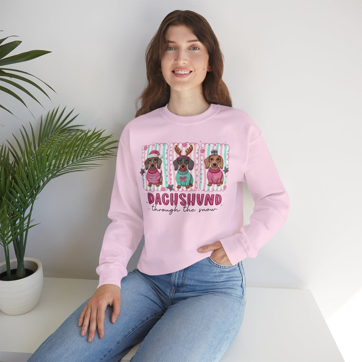 Dachshund Through the Snow – Gildan Heavy Blend | Trendy Women’s Soft Sweatshirt. Direct to Garment. Printed & Shipped in the USA. Unisex Sizes.