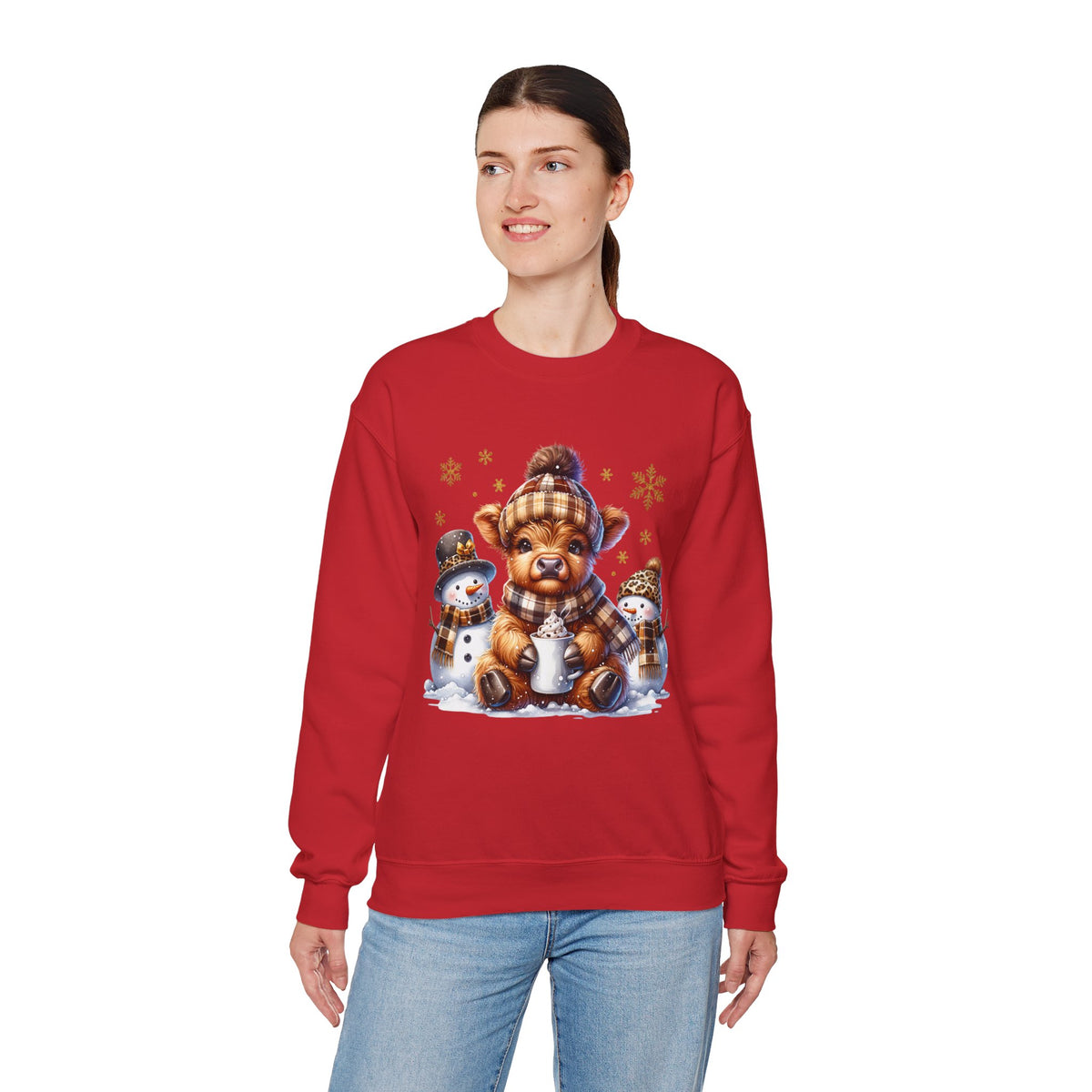 Cute Highland Cow with Snowmen, Winter – Gildan Heavy Blend | Trendy Women’s Soft Sweatshirt. Direct to Garment. Printed & Shipped in the USA. Unisex Sizes.