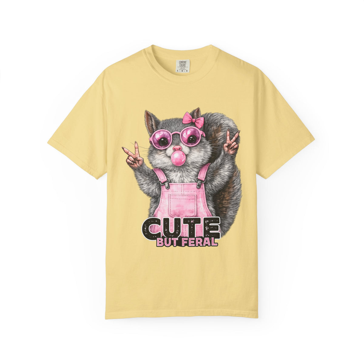 Cute But Feral, Squirrel in Pink Bibs - Comfort Colors | Trendy Women's T-Shirt. Direct to Garment. Printed & Shipped in the USA. Unisex Sizes.