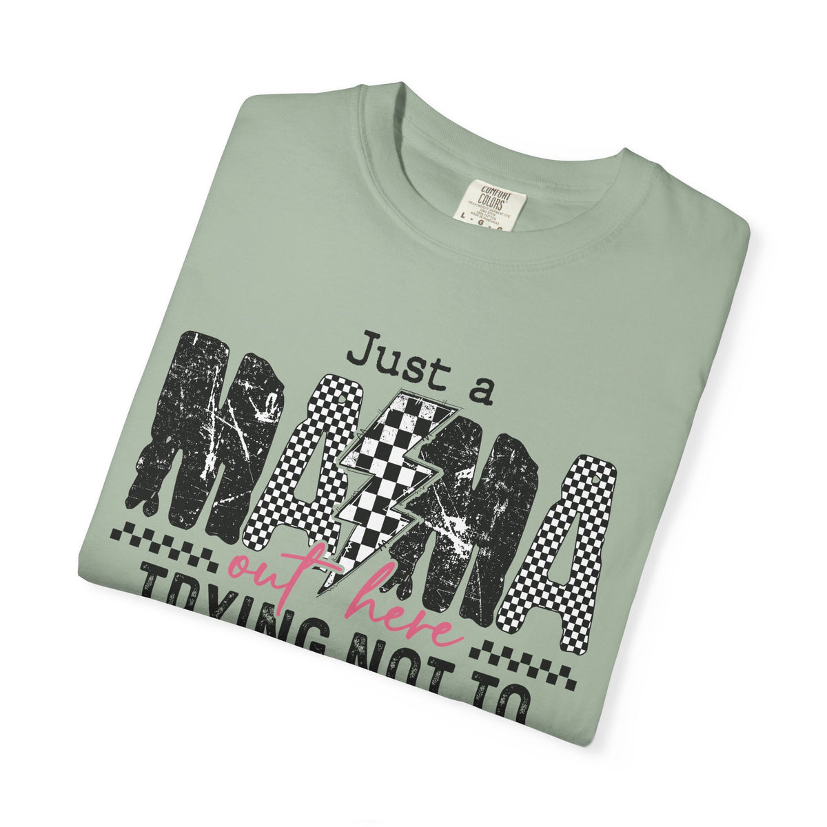 Just a Mama Out Here Trying Not To Raise Assholes - Comfort Colors | Trendy Women's T-Shirt. Direct to Garment. Printed & Shipped in the USA. Unisex Sizes.
