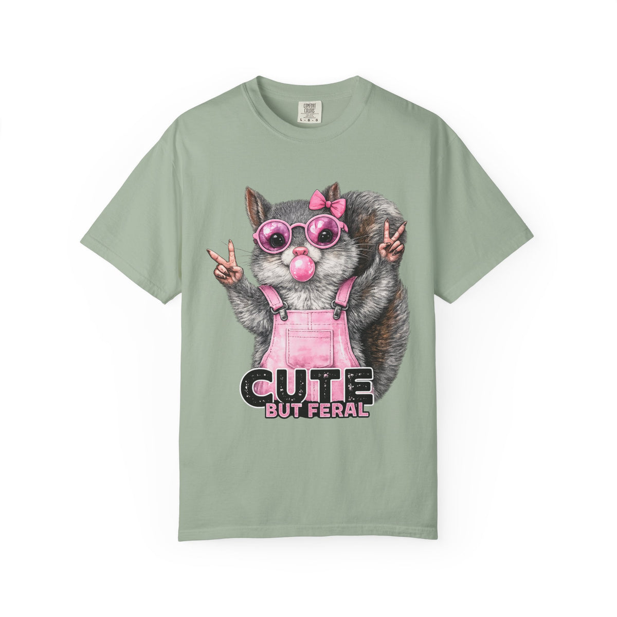 Cute But Feral, Squirrel in Pink Bibs - Comfort Colors | Trendy Women's T-Shirt. Direct to Garment. Printed & Shipped in the USA. Unisex Sizes.