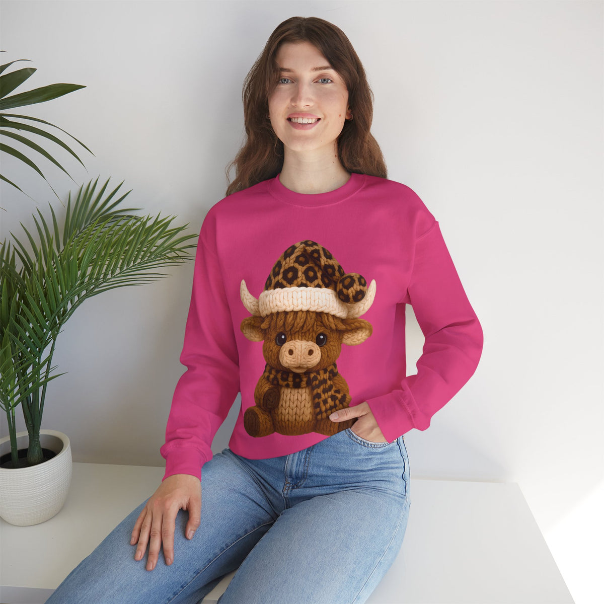 Cute Highland Cow with Leopard Santa Hat Christmas – Gildan Heavy Blend | Trendy Women’s Soft Sweatshirt. Direct to Garment. Printed & Shipped in the USA. Unisex Sizes.
