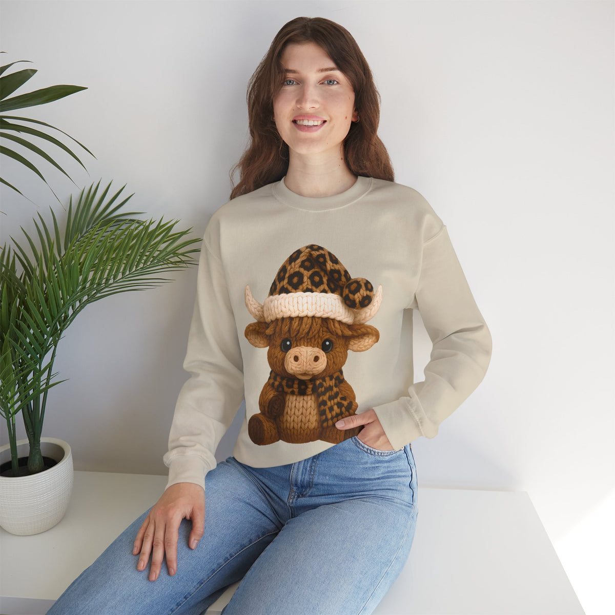 Cute Highland Cow with Leopard Santa Hat Christmas – Gildan Heavy Blend | Trendy Women’s Soft Sweatshirt. Direct to Garment. Printed & Shipped in the USA. Unisex Sizes.