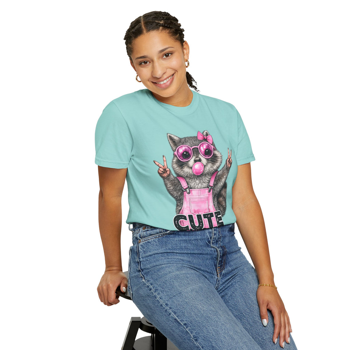 Cute But Feral, Raccoon in Pink Bibs - Comfort Colors | Trendy Women's T-Shirt. Direct to Garment. Printed & Shipped in the USA. Unisex Sizes.