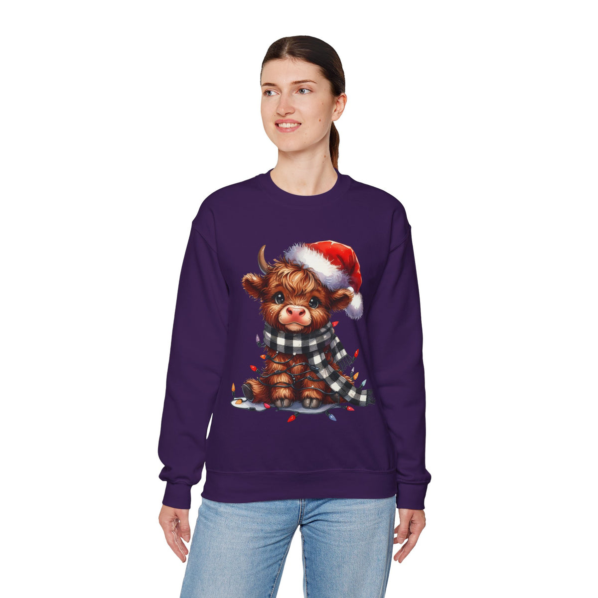Cute Highland Cow Santa Hat Scarf Christmas Lights – Gildan Heavy Blend | Trendy Women’s Soft Sweatshirt. Direct to Garment. Printed & Shipped in the USA. Unisex Sizes.