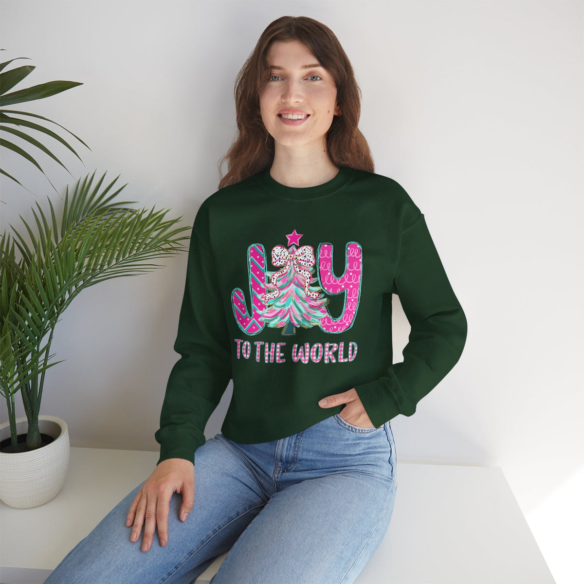 Joy to the World w/Christmas Tree Pink and Teal – Gildan Heavy Blend | Trendy Women’s Soft Sweatshirt. Direct to Garment. Printed & Shipped in the USA. Unisex Sizes.