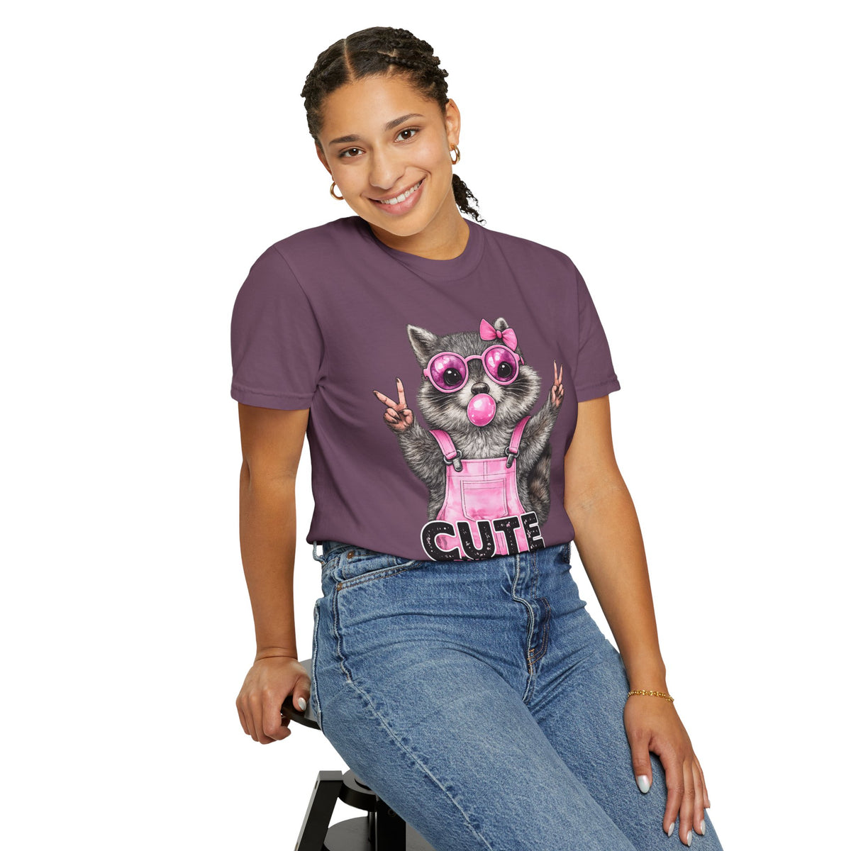 Cute But Feral, Raccoon in Pink Bibs - Comfort Colors | Trendy Women's T-Shirt. Direct to Garment. Printed & Shipped in the USA. Unisex Sizes.