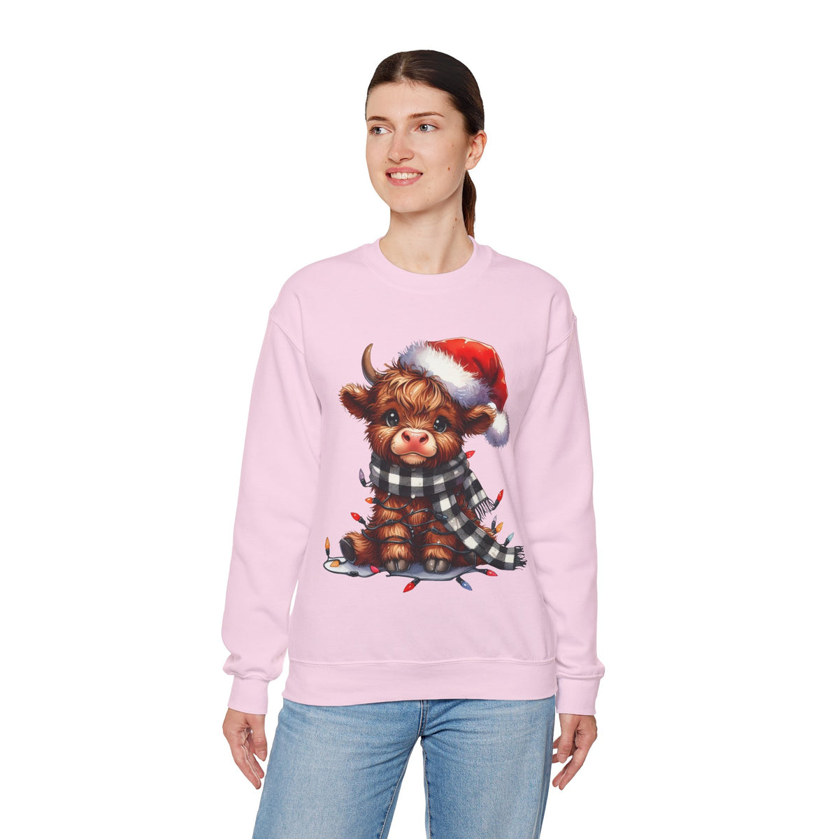 Cute Highland Cow Santa Hat Scarf Christmas Lights – Gildan Heavy Blend | Trendy Women’s Soft Sweatshirt. Direct to Garment. Printed & Shipped in the USA. Unisex Sizes.
