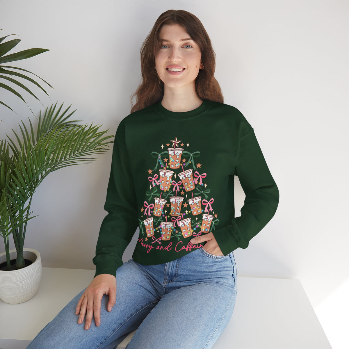 Merry and Caffeinated Iced Coffee Christmas Tree – Gildan Heavy Blend | Trendy Women’s Soft Sweatshirt. Direct to Garment. Printed & Shipped in the USA. Unisex Sizes.
