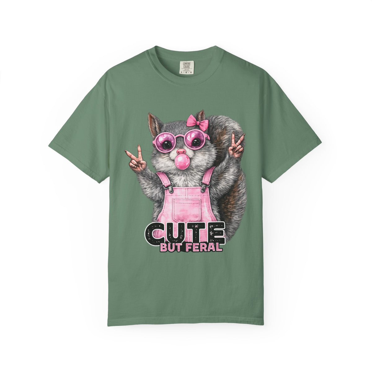 Cute But Feral, Squirrel in Pink Bibs - Comfort Colors | Trendy Women's T-Shirt. Direct to Garment. Printed & Shipped in the USA. Unisex Sizes.