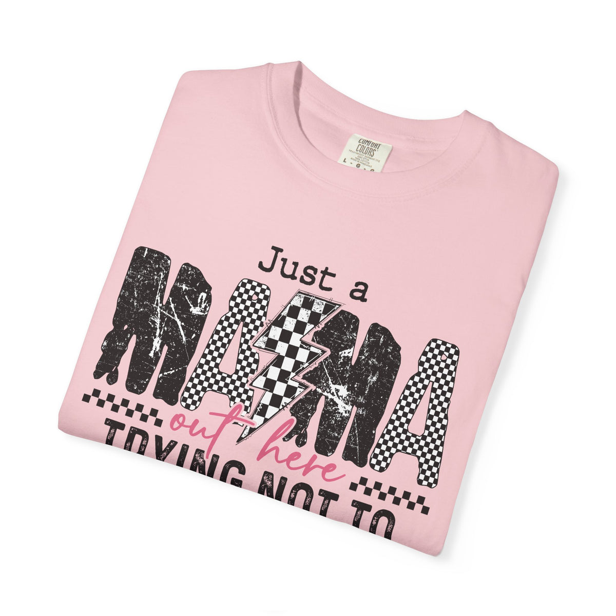 Just a Mama Out Here Trying Not To Raise Assholes - Comfort Colors | Trendy Women's T-Shirt. Direct to Garment. Printed & Shipped in the USA. Unisex Sizes.