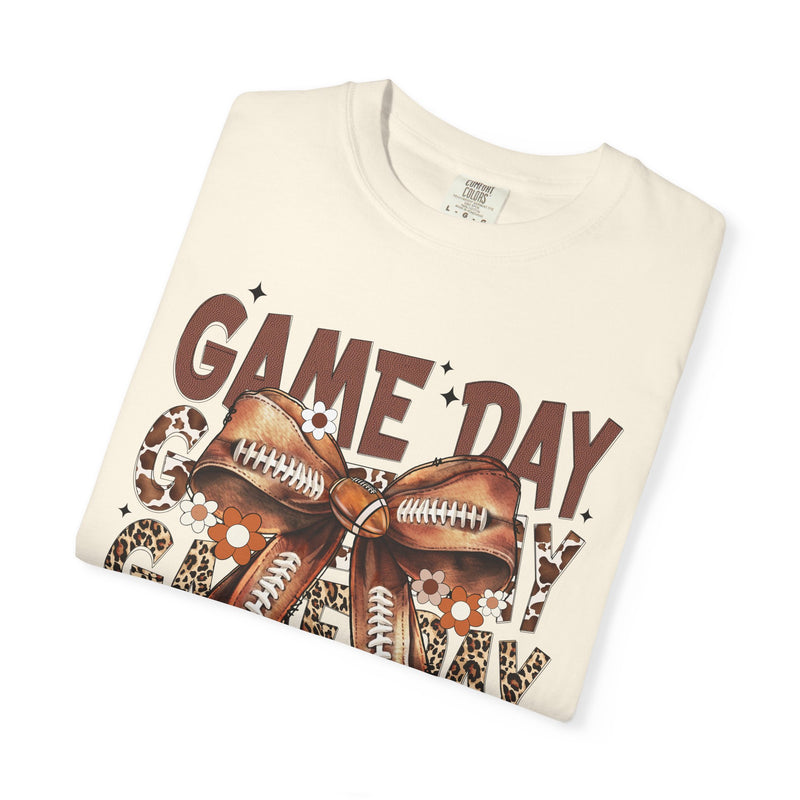 Game Day - Football Bow - Comfort Colors | Trendy Women's T-Shirt. Direct to Garment. Printed & Shipped in the USA. Unisex Sizes.