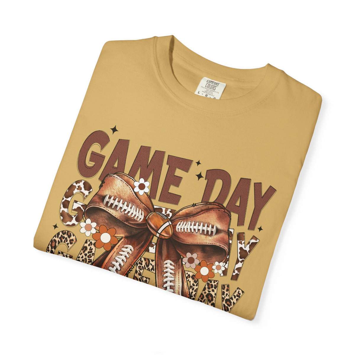 Game Day - Football Bow - Comfort Colors | Trendy Women's T-Shirt. Direct to Garment. Printed & Shipped in the USA. Unisex Sizes.